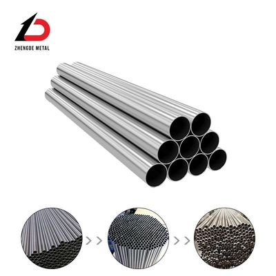 Precio del tubo de intercambio de calor sin costura soldado 304 316L 321 espejo laminado en frío brillante dúplex tirado en frío calderas de acero inoxidable